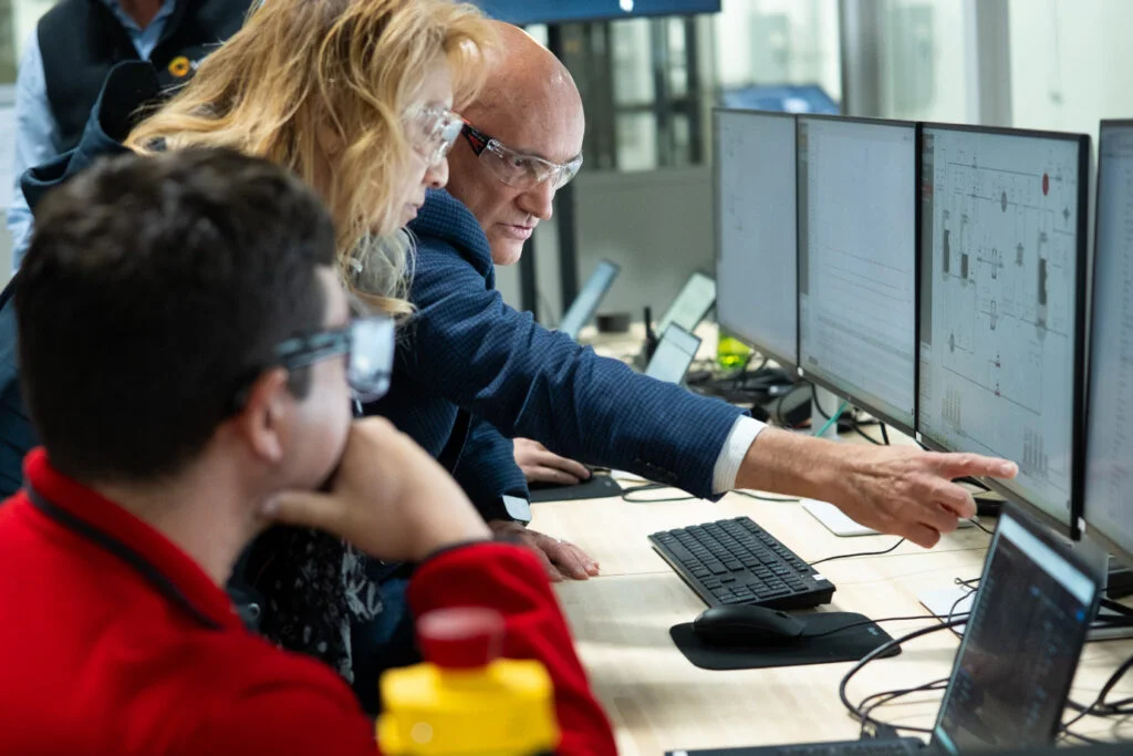 Judy Priest, corporate vice president and chief technical officer of Cloud Operations and Innovation at Microsoft, and Erhan Karaca, vice president of engineering at VEIR, during factory test of 3MW superconducting cable