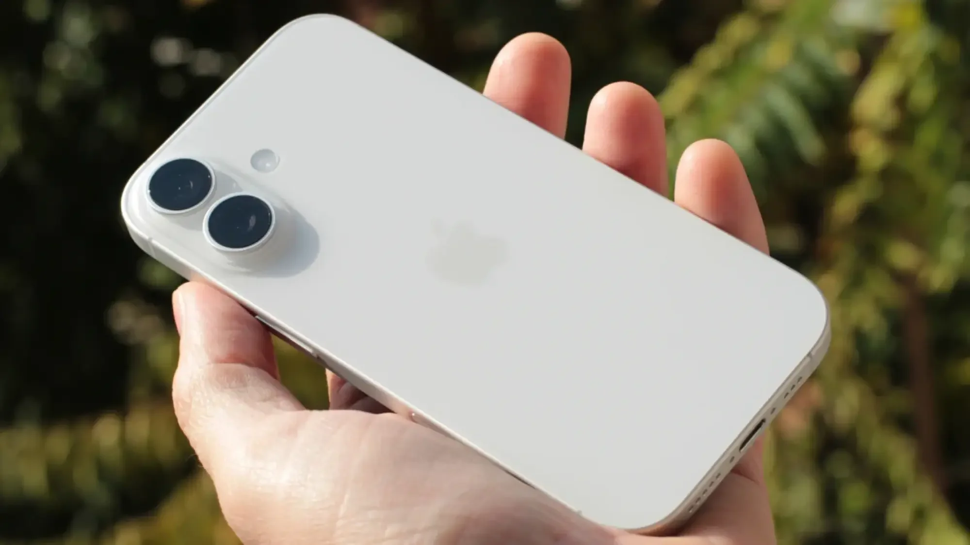 iphone 17 held in hand outside