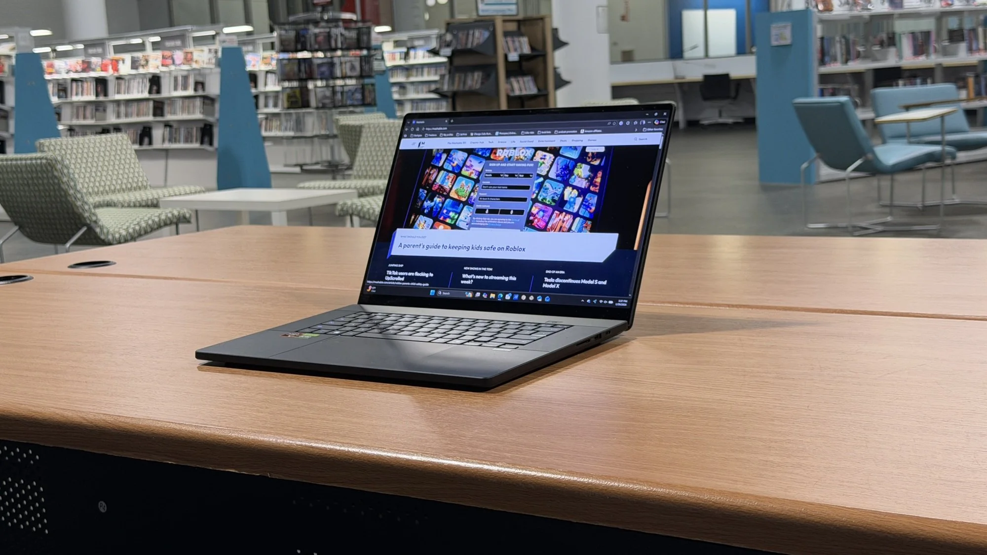 Asus ProArt P16 laptop on table in library